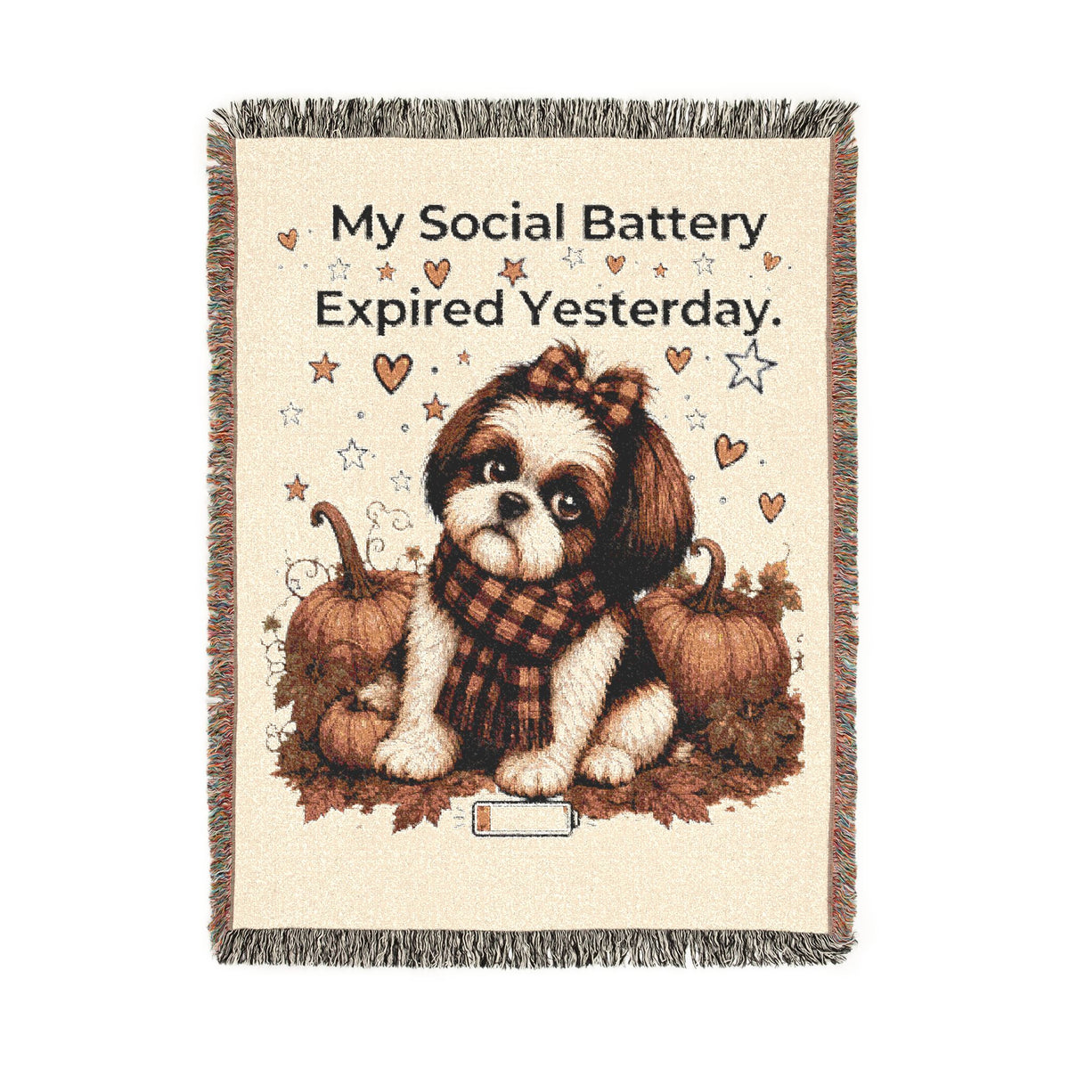 A square woven throw blanket with fringe edges, featuring a cream background and a central illustration of a brown and white Shih Tzu dog wearing a plaid scarf, sitting between two pumpkins. The text reads 'My Social Battery Expired Yesterday.