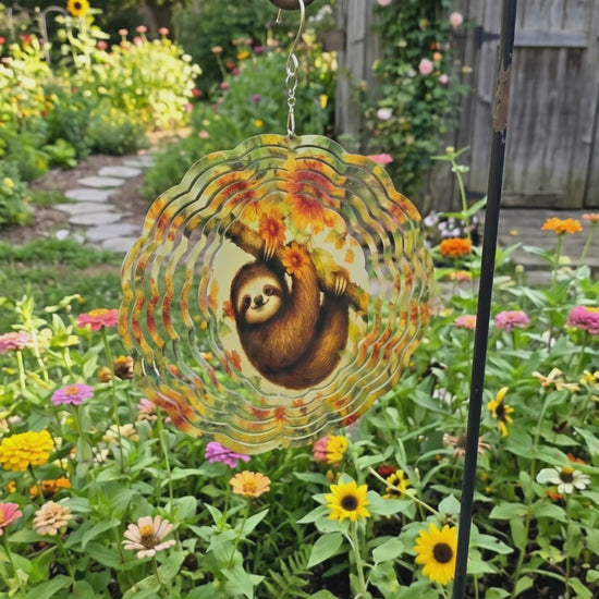 metal garden wind spinner featuring a sloth illustration  spinning video