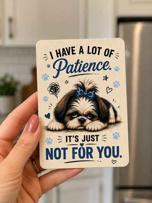 Coaster with a dog illustration and humorous text held in a hand, kitchen background