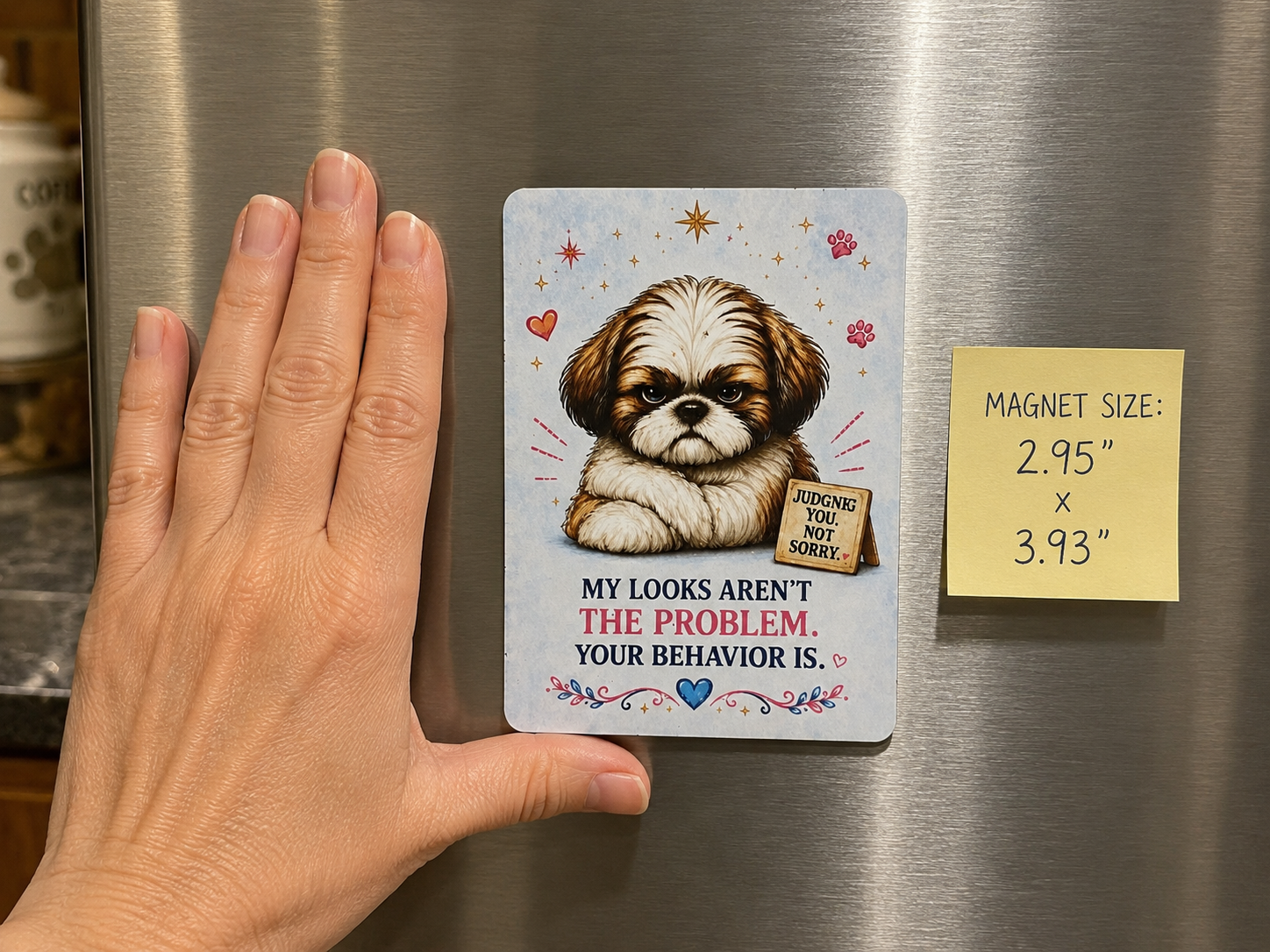 Magnet with a Shih Tzu dog illustration and text on a refrigerator, hand shown for scale.