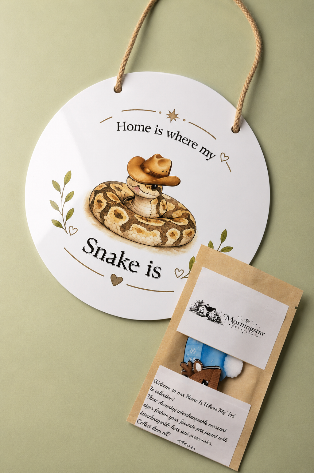 Decorative metal sign with snake illustration and cowboy hat, accompanied by a product packaging on a light green background.