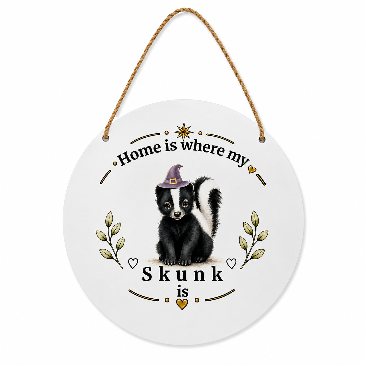 Round white ceramic hanging wall plaque with a rope hanger, featuring a skunk illustration wearing a witch hat and the text 'Home is where my Skunk is'.